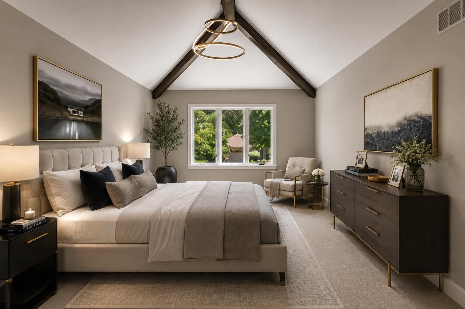 Renovated primary bedroom with beamed vaulted ceiling
